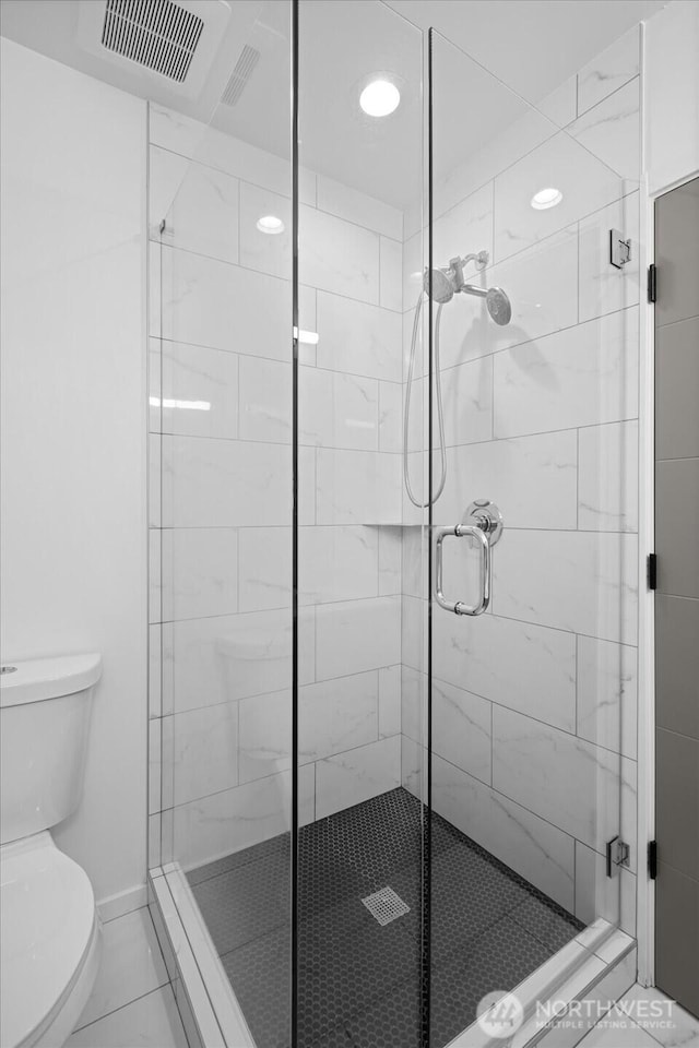 9030 18th Ave SW Unit E, Seattle, WA 98106 - bathroom featuring a stall shower, tile patterned flooring, and recessed lighting