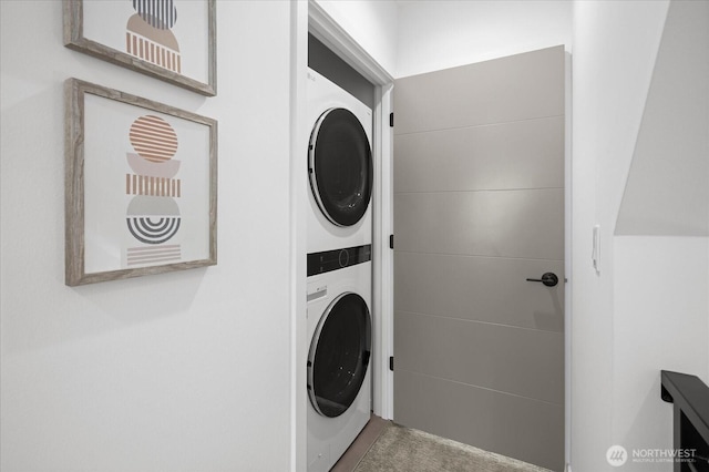 9030 18th Ave SW Unit E, Seattle, WA 98106 - washroom with stacked washer and clothes dryer