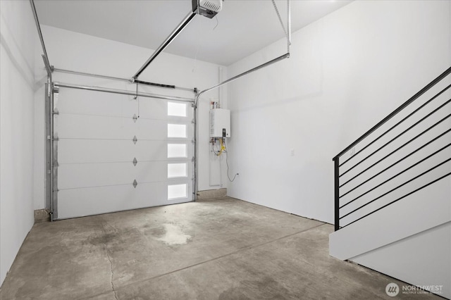 9030 18th Ave SW Unit E, Seattle, WA 98106 - garage with a garage door opener and water heater
