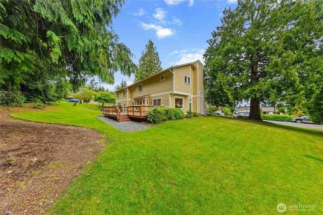 2515 16th St, Anacortes, WA 98221 - view of side of property featuring a deck and a lawn
