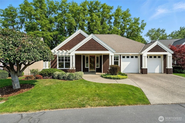 847 SE Covey Ct, College Place, WA 99324 - view of front of property with an attached garage, concrete driveway, and a front lawn