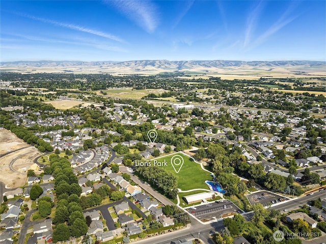 847 SE Covey Ct, College Place, WA 99324 - aerial view of property and surrounding area featuring mountains and nearby suburban area