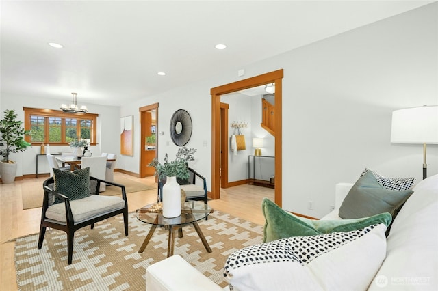 3401 York Rd S, Seattle, WA 98144 - living room with a chandelier, light wood-type flooring, recessed lighting, and stairway