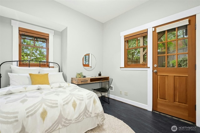 3401 York Rd S, Seattle, WA 98144 - bedroom featuring dark wood-style flooring and multiple windows