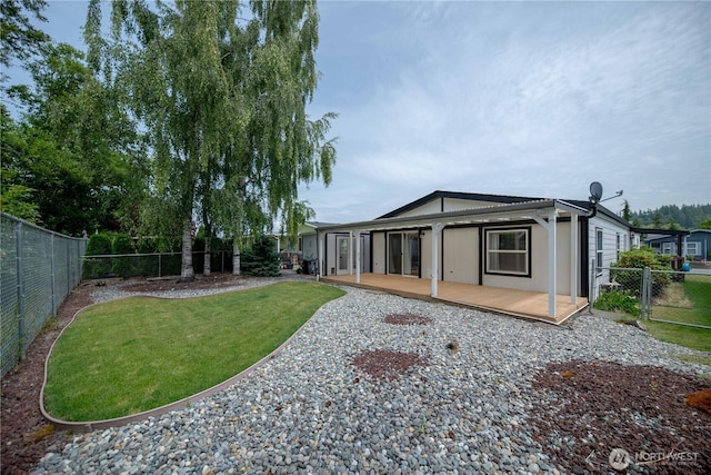2610 E Section St Unit 20, Mount Vernon, WA 98274 - back of property with a fenced backyard and a deck