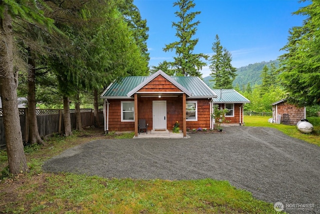 6258 Bellwood Dr, Maple Falls, WA 98266 - rustic home with dirt driveway, a metal roof, and a standing seam roof