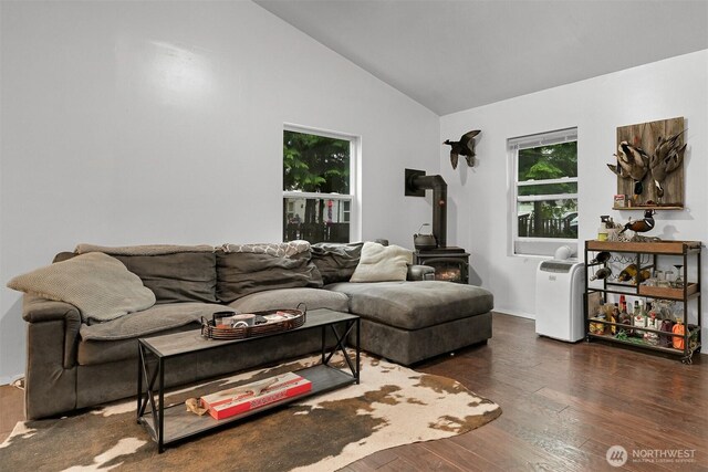 6258 Bellwood Dr, Maple Falls, WA 98266 - living area with a wood stove, lofted ceiling, and wood finished floors