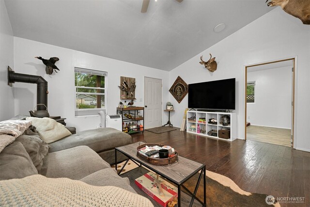 6258 Bellwood Dr, Maple Falls, WA 98266 - living room with vaulted ceiling, a wood stove, wood finished floors, and a ceiling fan