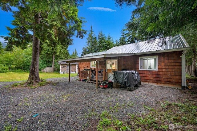 6258 Bellwood Dr, Maple Falls, WA 98266 - back of house with a metal roof and a wooden deck
