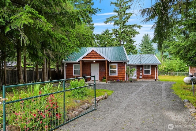 6258 Bellwood Dr, Maple Falls, WA 98266 - rustic home featuring a metal roof and driveway