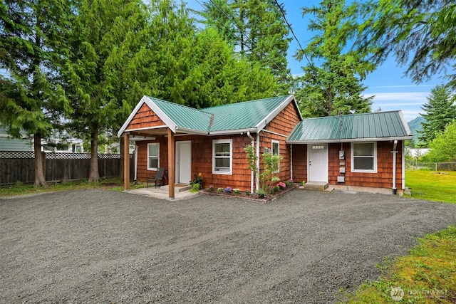6258 Bellwood Dr, Maple Falls, WA 98266 - view of front of property with a metal roof and driveway