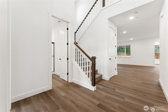 13937 181st St E Unit 8, Puyallup, WA 98374 - stairs with wood finished floors and recessed lighting
