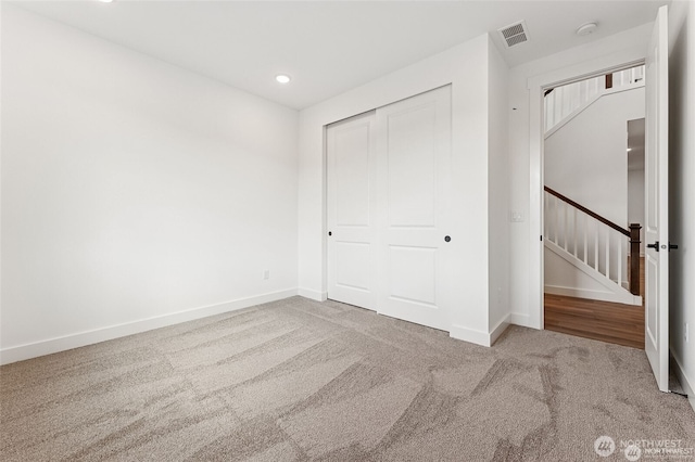 13937 181st St E Unit 8, Puyallup, WA 98374 - unfurnished bedroom with carpet floors, a closet, and recessed lighting