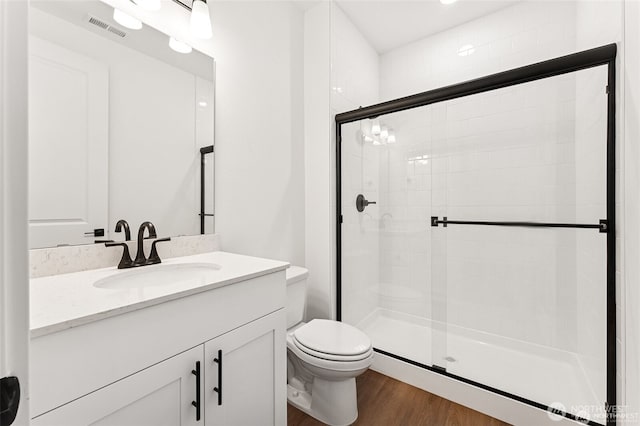 13937 181st St E Unit 8, Puyallup, WA 98374 - full bathroom with wood finished floors, a stall shower, and vanity
