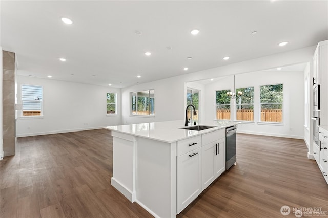 13937 181st St E Unit 8, Puyallup, WA 98374 - kitchen with appliances with stainless steel finishes, plenty of natural light, an island with sink, and recessed lighting