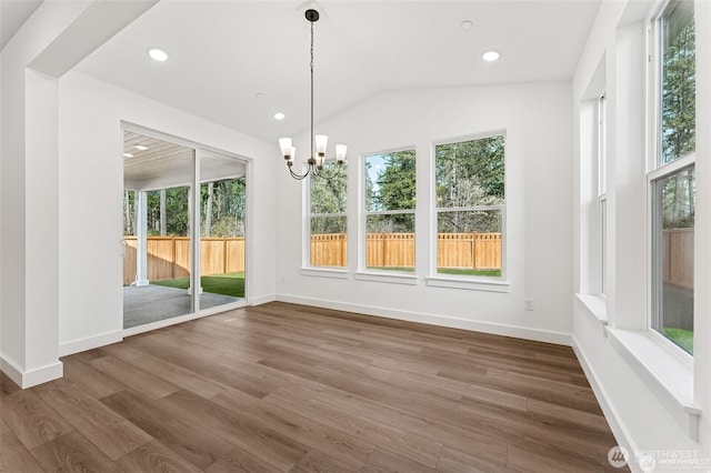 13937 181st St E Unit 8, Puyallup, WA 98374 - unfurnished sunroom with a chandelier and lofted ceiling