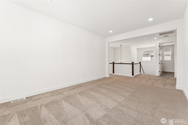 13937 181st St E Unit 8, Puyallup, WA 98374 - carpeted empty room with recessed lighting and a chandelier