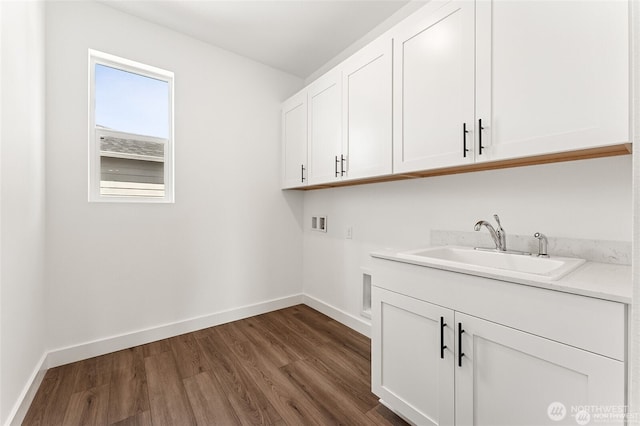 13937 181st St E Unit 8, Puyallup, WA 98374 - laundry room with cabinet space, washer hookup, and dark wood-type flooring