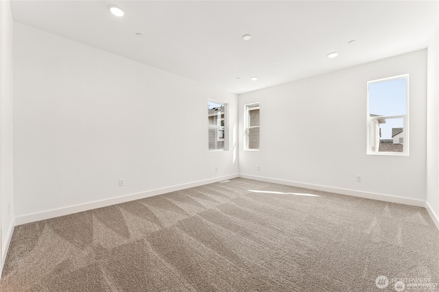 13937 181st St E Unit 8, Puyallup, WA 98374 - unfurnished room with light colored carpet and recessed lighting