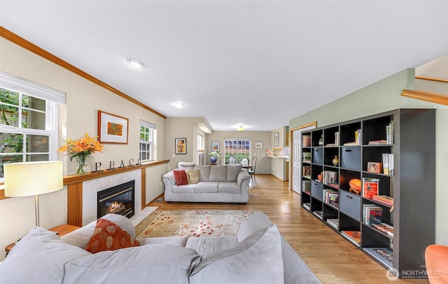 2616 16th St, Bellingham, WA 98229 - living room featuring wood finished floors, ornamental molding, a fireplace, and recessed lighting