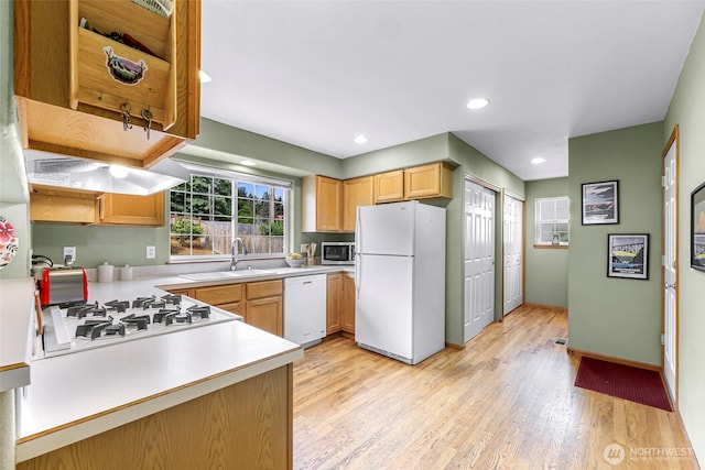 2616 16th St, Bellingham, WA 98229 - kitchen featuring white appliances, light countertops, light wood finished floors, and recessed lighting