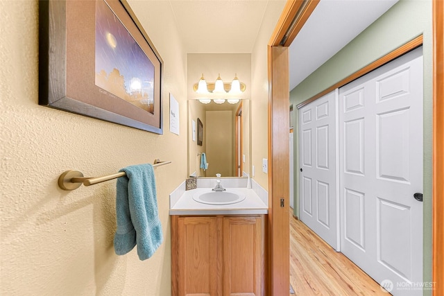 2616 16th St, Bellingham, WA 98229 - bathroom featuring vanity and wood finished floors