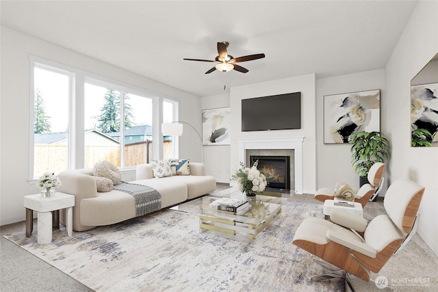 1401 89th Ave SE, Tumwater, WA 98501 - living room featuring a ceiling fan and a fireplace with flush hearth