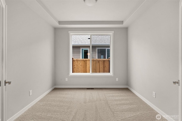 1401 89th Ave SE, Tumwater, WA 98501 - empty room with a tray ceiling and carpet floors