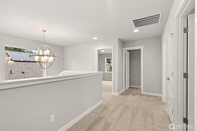 1401 89th Ave SE, Tumwater, WA 98501 - hall with plenty of natural light, light colored carpet, a chandelier, and recessed lighting