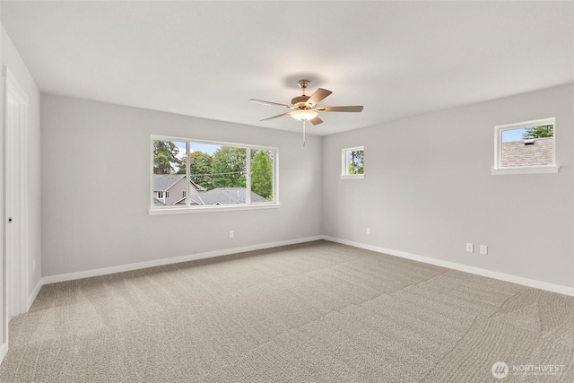 1401 89th Ave SE, Tumwater, WA 98501 - empty room with carpet and a ceiling fan