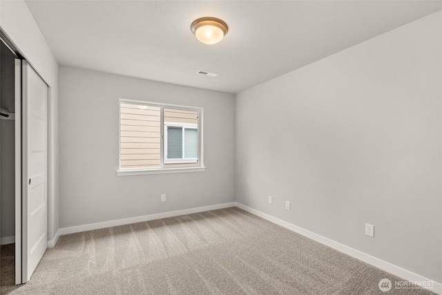 1401 89th Ave SE, Tumwater, WA 98501 - unfurnished bedroom with carpet flooring and a closet