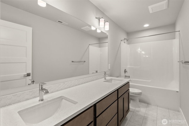 1401 89th Ave SE, Tumwater, WA 98501 - bathroom featuring double vanity, tub / shower combination, recessed lighting, and tile patterned floors