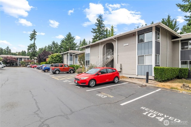 17306 NE 45th St Unit 116, Redmond, WA 98052 - view of building exterior featuring uncovered parking
