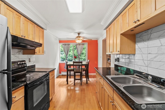 17306 NE 45th St Unit 116, Redmond, WA 98052 - kitchen featuring black electric range, under cabinet range hood, crown molding, backsplash, and freestanding refrigerator