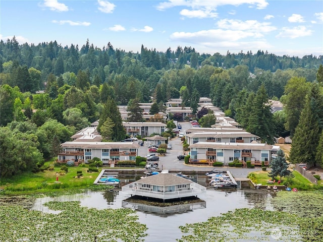 17306 NE 45th St Unit 116, Redmond, WA 98052 - view of subject property featuring a heavily wooded area and a nearby body of water