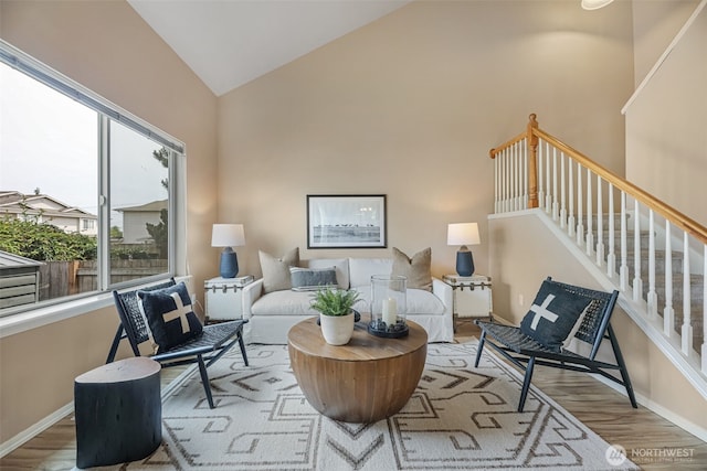 9323 4th Ave W, Everett, WA 98204 - living room with wood finished floors, vaulted ceiling, and stairs