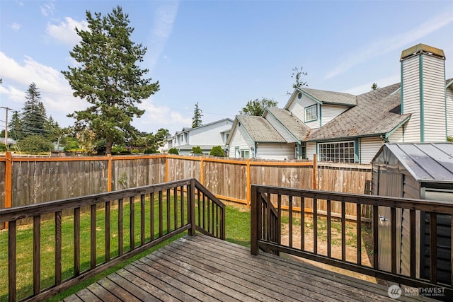 9323 4th Ave W, Everett, WA 98204 - wooden deck featuring a fenced backyard and an outdoor structure