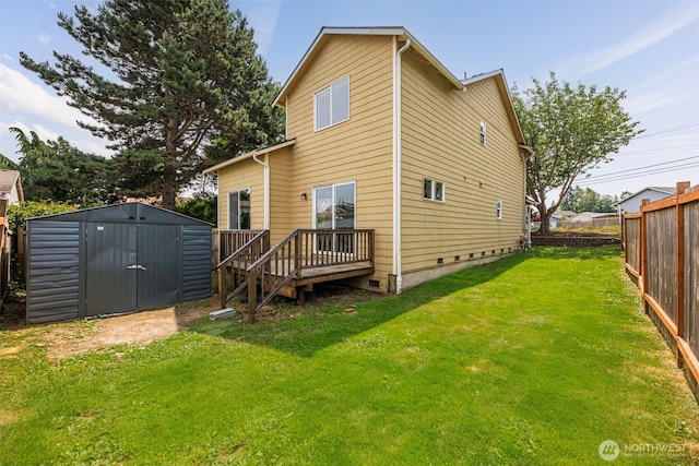 9323 4th Ave W, Everett, WA 98204 - back of house featuring a fenced backyard, a shed, and a deck