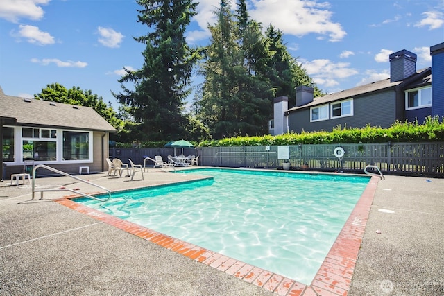 26327 116th Ave SE Unit E102, Kent, WA 98030 - community pool featuring a patio area