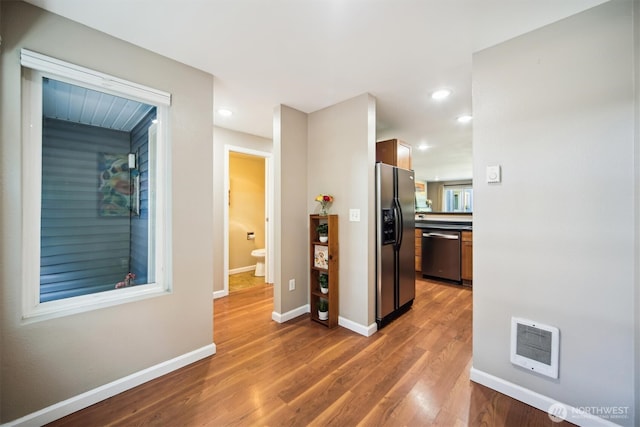 26327 116th Ave SE Unit E102, Kent, WA 98030 - hallway with wood finished floors, heating unit, and recessed lighting