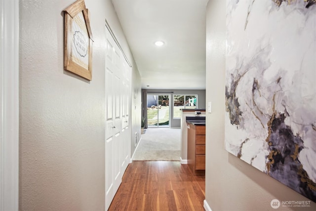 26327 116th Ave SE Unit E102, Kent, WA 98030 - hallway with wood finished floors and recessed lighting