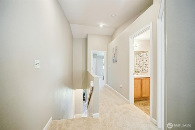 26327 116th Ave SE Unit E102, Kent, WA 98030 - corridor featuring an upstairs landing and light carpet