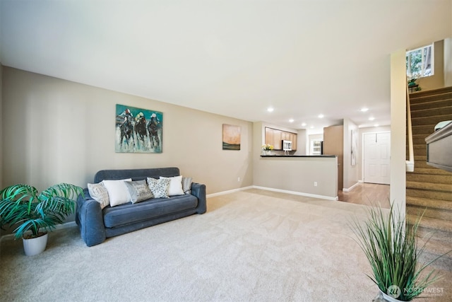 26327 116th Ave SE Unit E102, Kent, WA 98030 - living room with stairs, recessed lighting, and light colored carpet