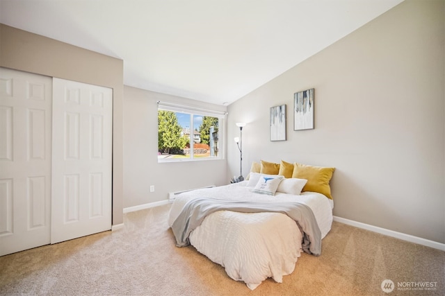 26327 116th Ave SE Unit E102, Kent, WA 98030 - carpeted bedroom featuring vaulted ceiling and a closet