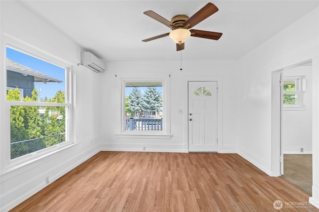 3510 S K St, Tacoma, WA 98418 - entrance foyer featuring a wall mounted AC, healthy amount of natural light, and light wood-type flooring