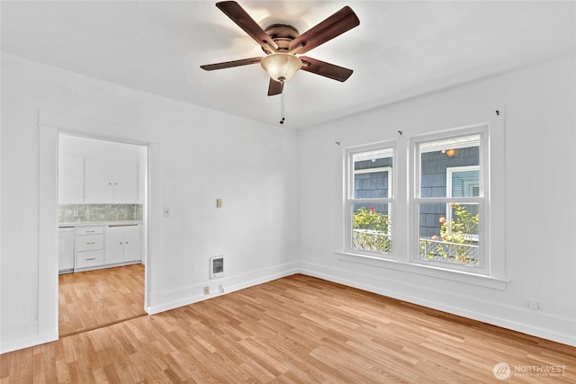 3510 S K St, Tacoma, WA 98418 - unfurnished room with light wood-type flooring and ceiling fan