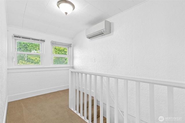 3510 S K St, Tacoma, WA 98418 - hallway featuring a wall mounted air conditioner, a textured wall, carpet floors, and lofted ceiling
