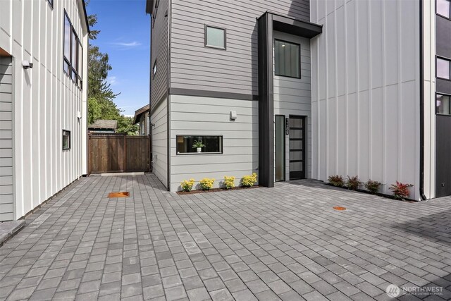 1120 NW 61st St Unit B, Seattle, WA 98107 - view of side of property featuring a patio