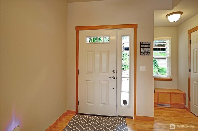 2102 256th St NW, Stanwood, WA 98292 - foyer entrance with light wood-style flooring and baseboards