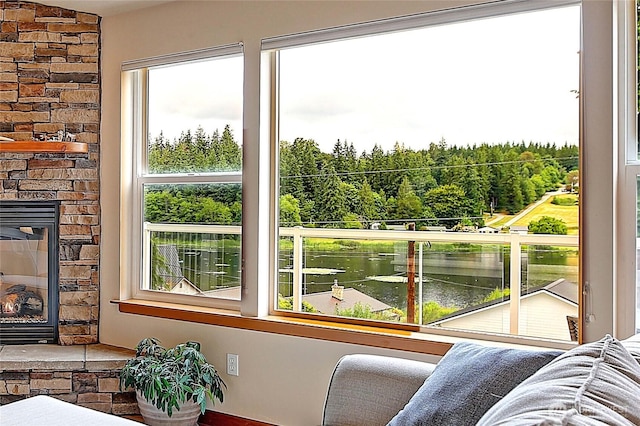 2102 256th St NW, Stanwood, WA 98292 - interior space with a fireplace and a water view